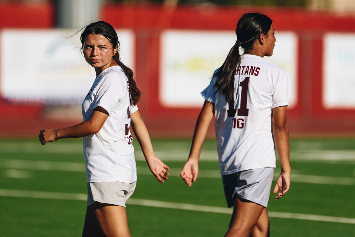 Cimarron-Memorial forward Alize Aleman (9) looks back at her teammates as she walks away from ...