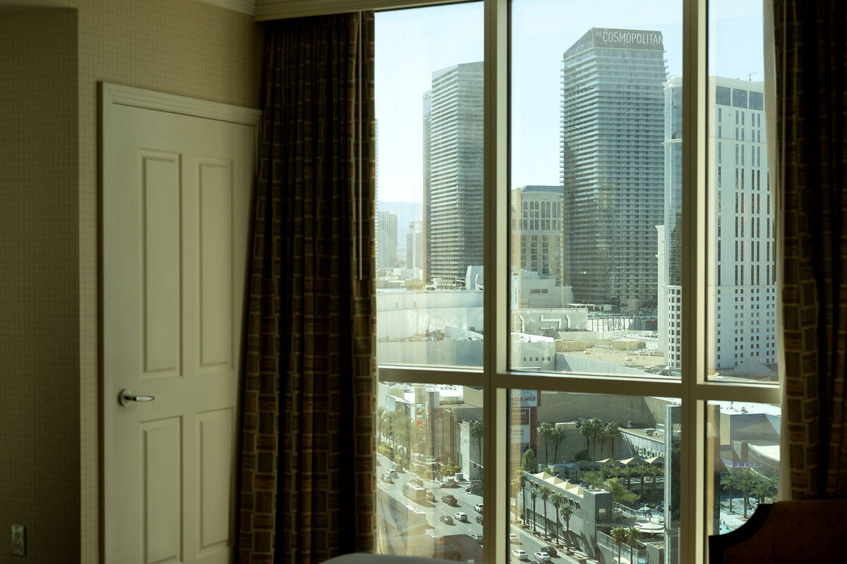 The Las Vegas Strip is visible from the bedroom of a penthouse suite for sale at The Signature ...