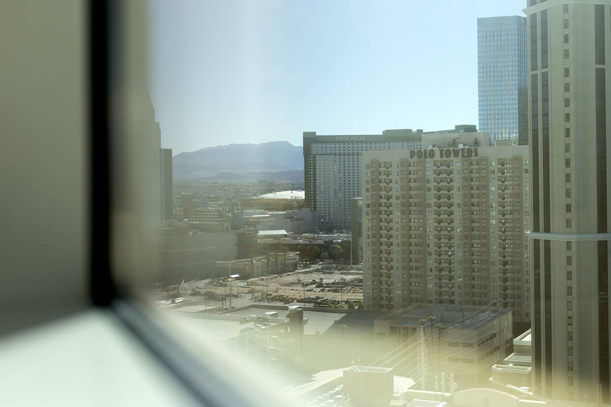 The Las Vegas Strip is visible from the bedroom of a penthouse suite for sale at The Signature ...