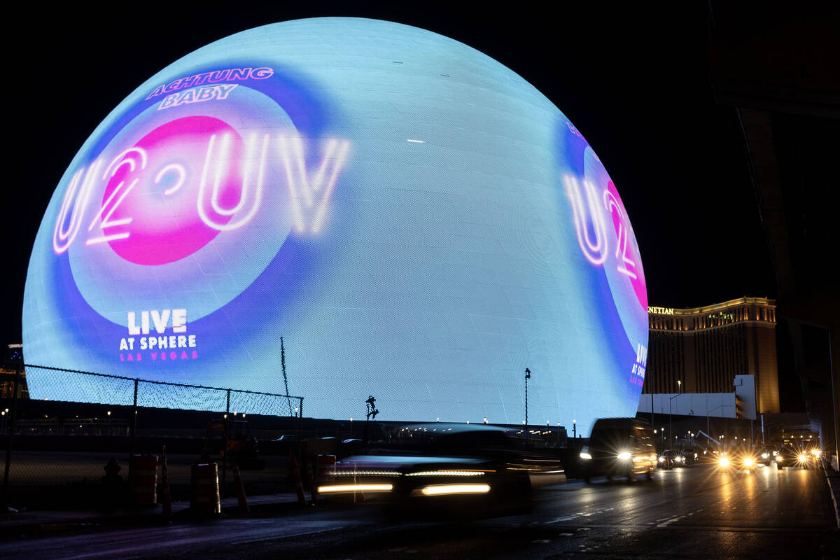 Traffic travels past The Sphere while it shows an advertisement for its opening show, U2, on Tu ...