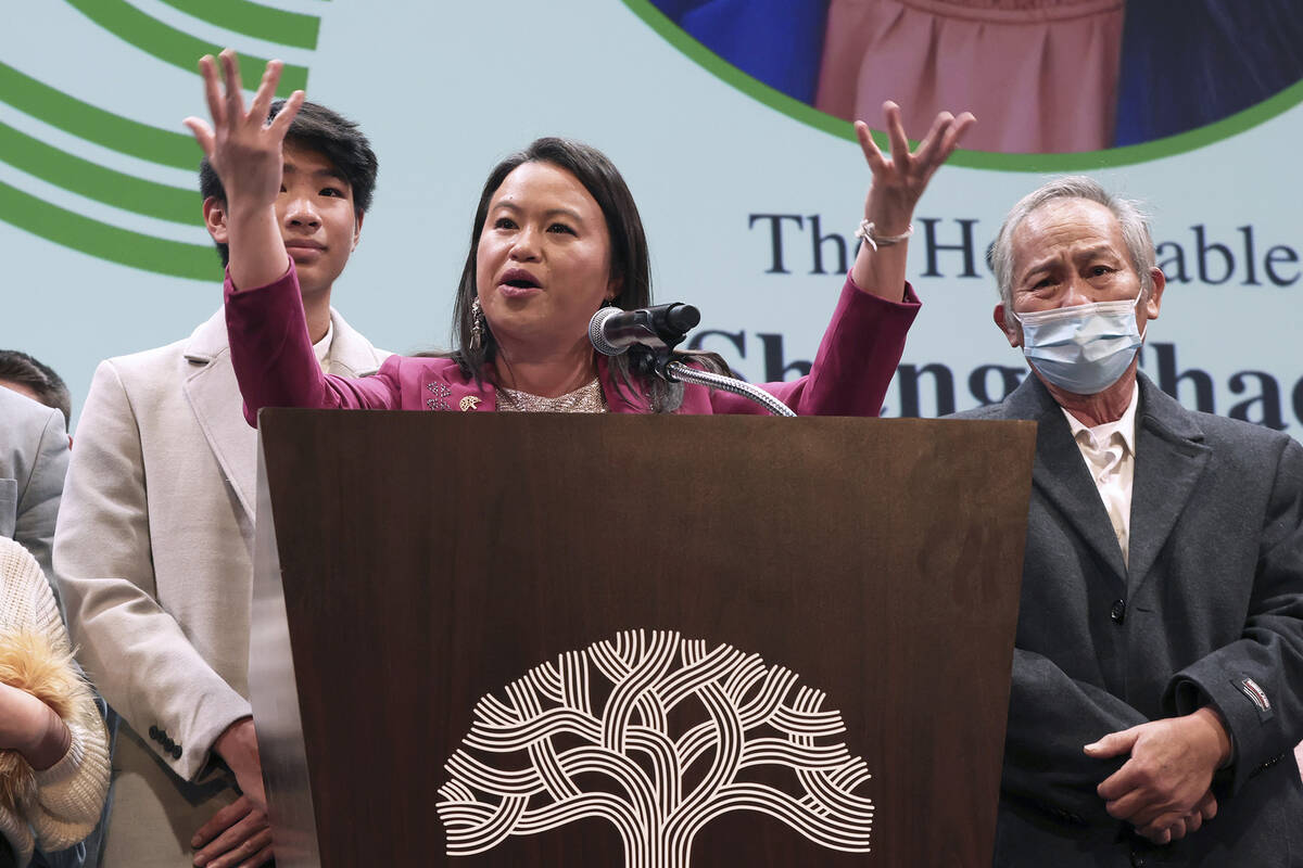 Oakland Mayor Sheng Thao delivers a speech while standing onstage with her family at the Paramo ...
