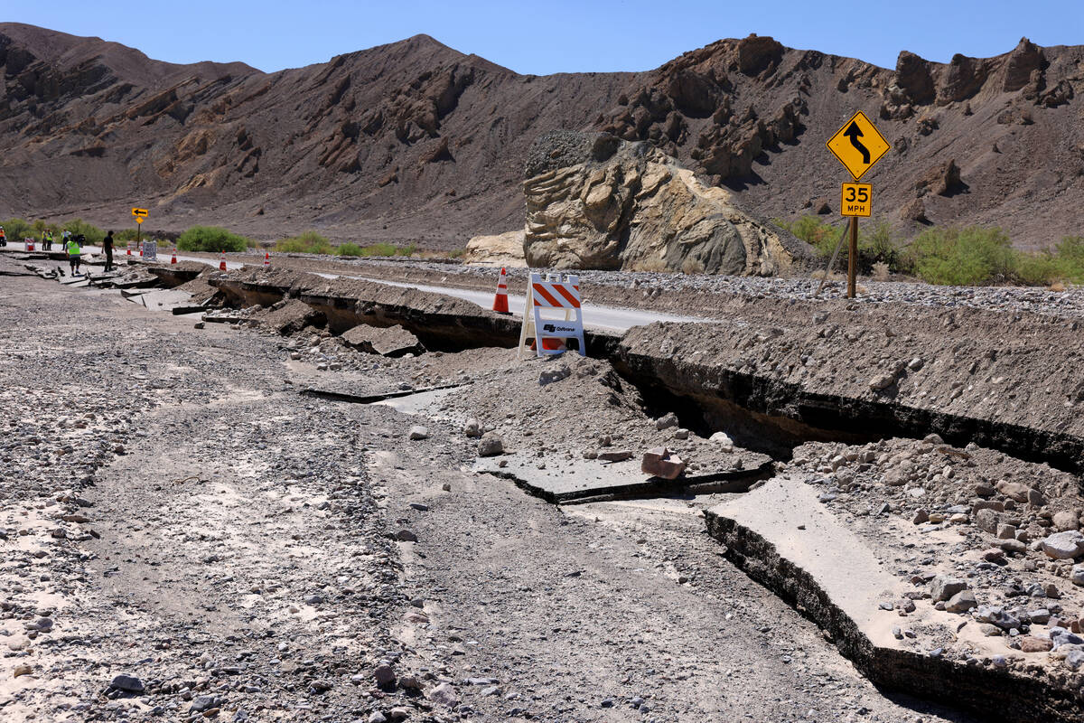Storm damage from Hilary is shown on State Route 190 on the way to Furnace Creek in Death Valle ...