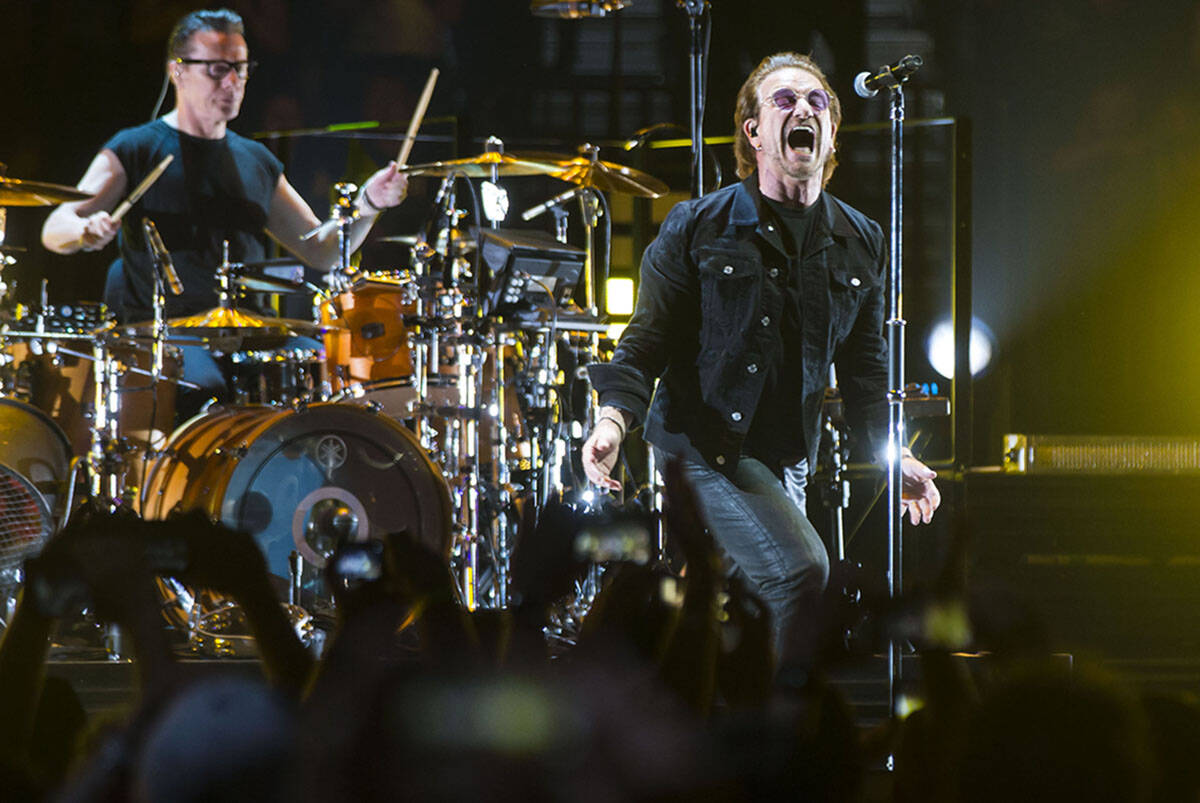 Larry Mullen Jr., left, and Bono of U2 perform at T-Mobile Arena in Las Vegas on Friday, May 11 ...