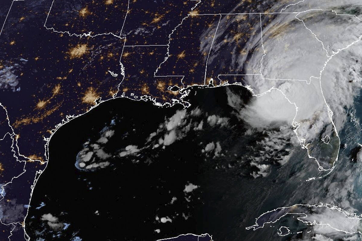 This image provided by NOAA shows shows Hurricane Idalia over Florida's Gulf Coast on Wednesday ...