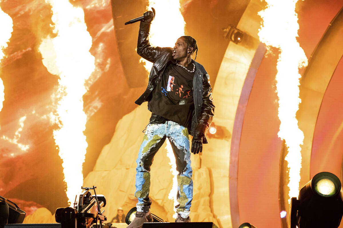 FILE - Travis Scott performs at the Astroworld Music Festival in Houston, Nov. 5, 2021. (Photo ...