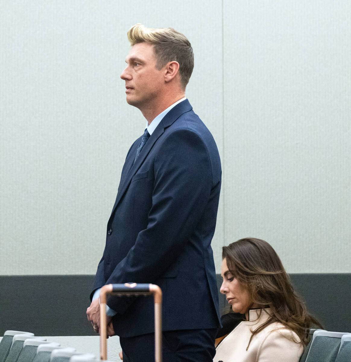 Nick Carter, a member of the Backstreet Boys, appears in court with his wife, Lauren Kitt, duri ...
