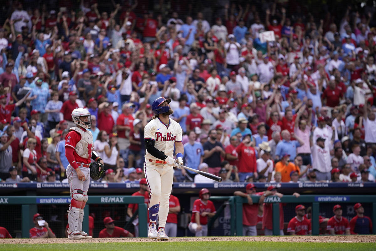 Philadelphia Phillies' Bryce Harper watches after hitting a two-run home run against Los Angele ...