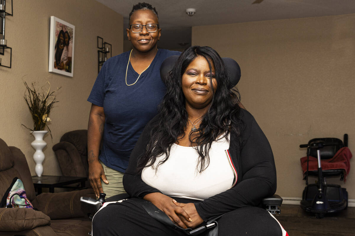 Nicole Brown, a home care worker with Consumer Direct Care Network, left, poses with her client ...