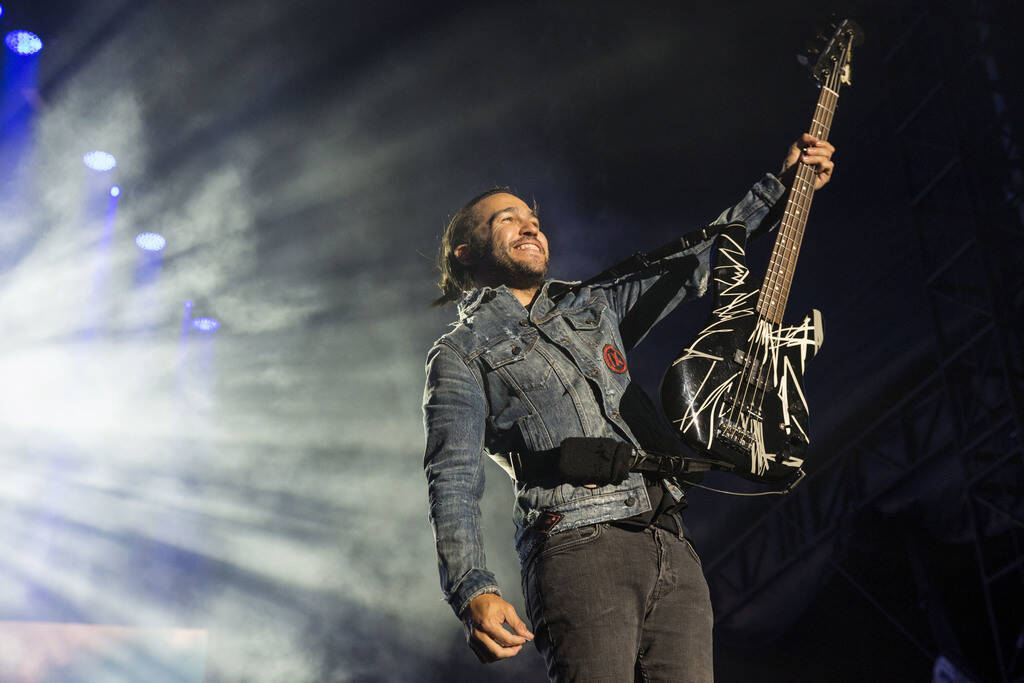 Pete Wentz, of Fall Out Boy, performs at Wrigley Field in Chicago, Saturday, Sept. 8, 2018. (As ...