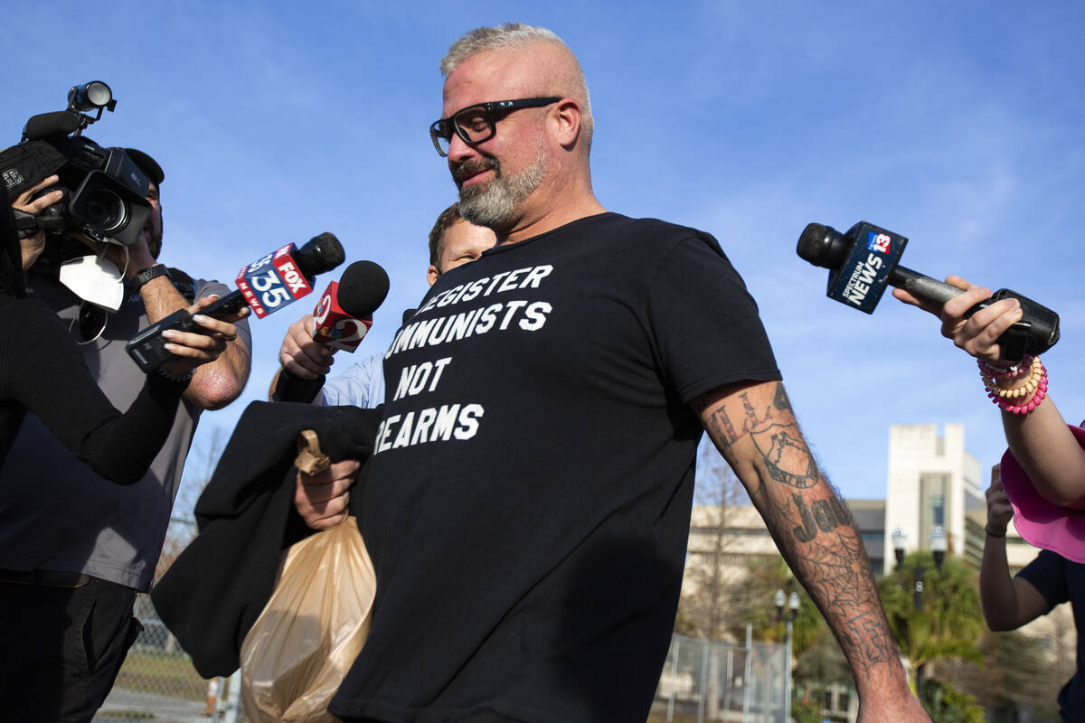 FILE - Proud Boys organizer Joseph Biggs walks from the George C. Young Federal Annex Courthous ...
