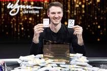 Eliot Hudon poses for a photo after his win in the final table of the World Poker Tour World Ch ...