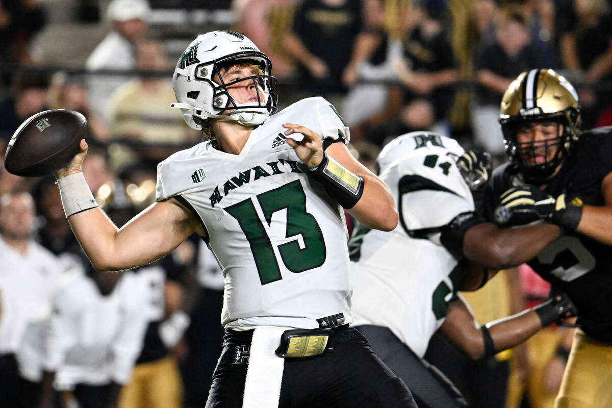 Hawaii quarterback Brayden Schager (13) passes against Vanderbilt during an NCAA football game ...