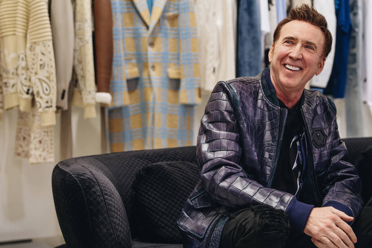 Nicolas Cage has a laugh during a grand opening event at the Philipp Plein boutique inside of t ...
