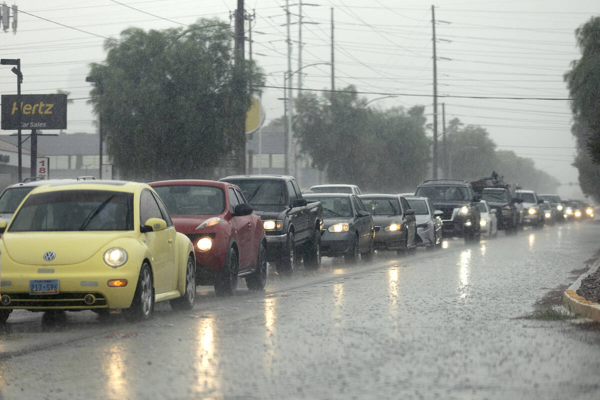 Traffic is backed up down East Sahara Avenue during heavy rains on Friday, Sept. 1, 2023, in La ...
