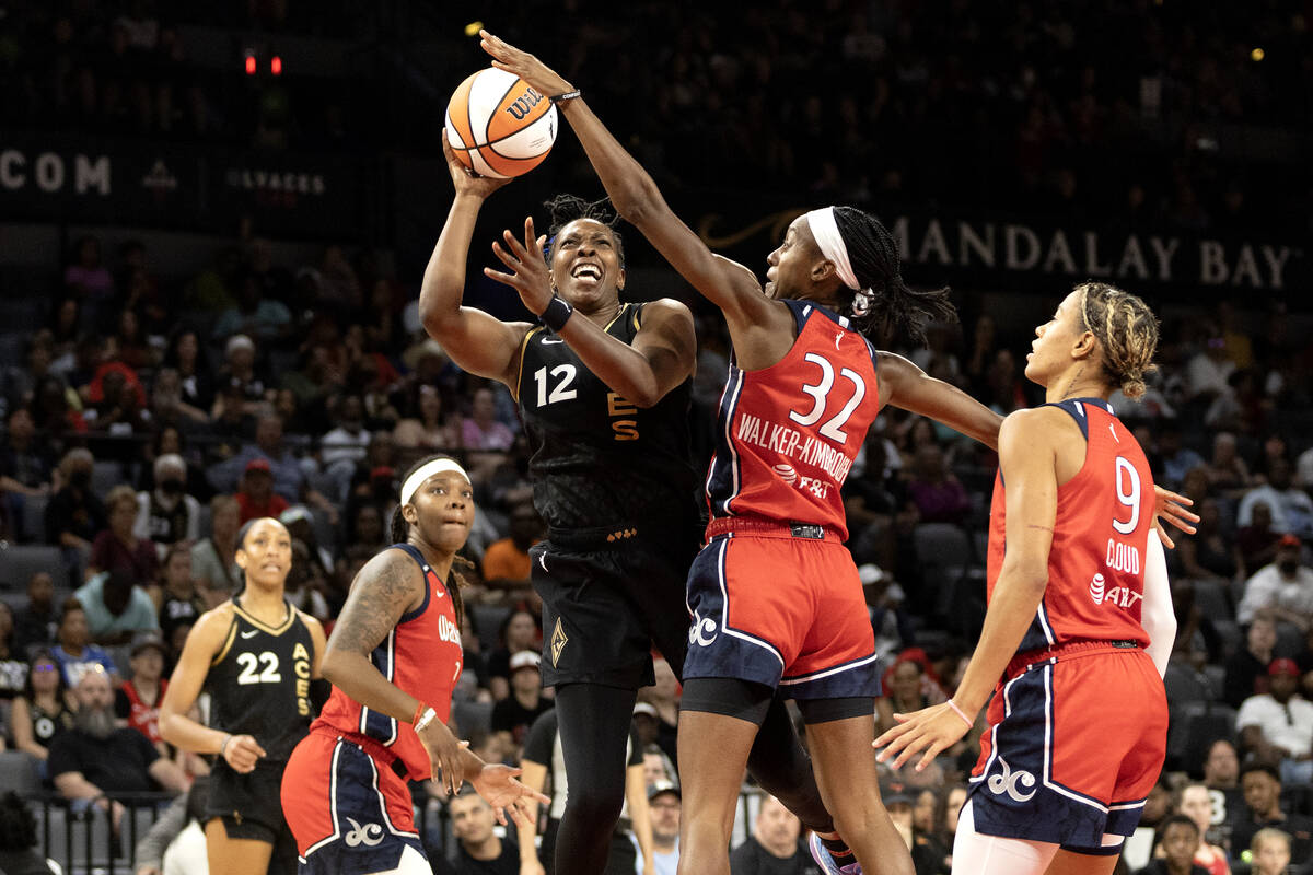 Las Vegas Aces guard Chelsea Gray (12) shoots against Washington Mystics guard Shatori Walker-K ...
