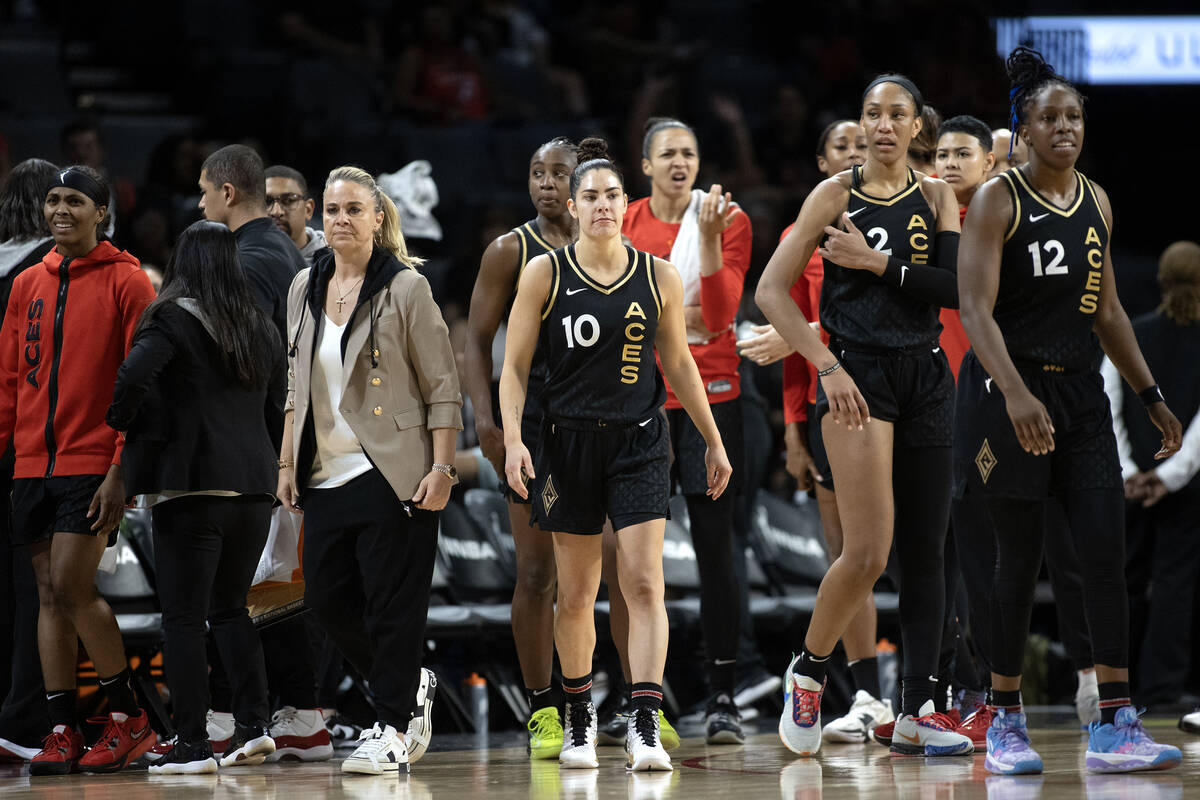 The Las Vegas Aces react as referees stay true to their flagrant foul call on guard Kelsey Plum ...