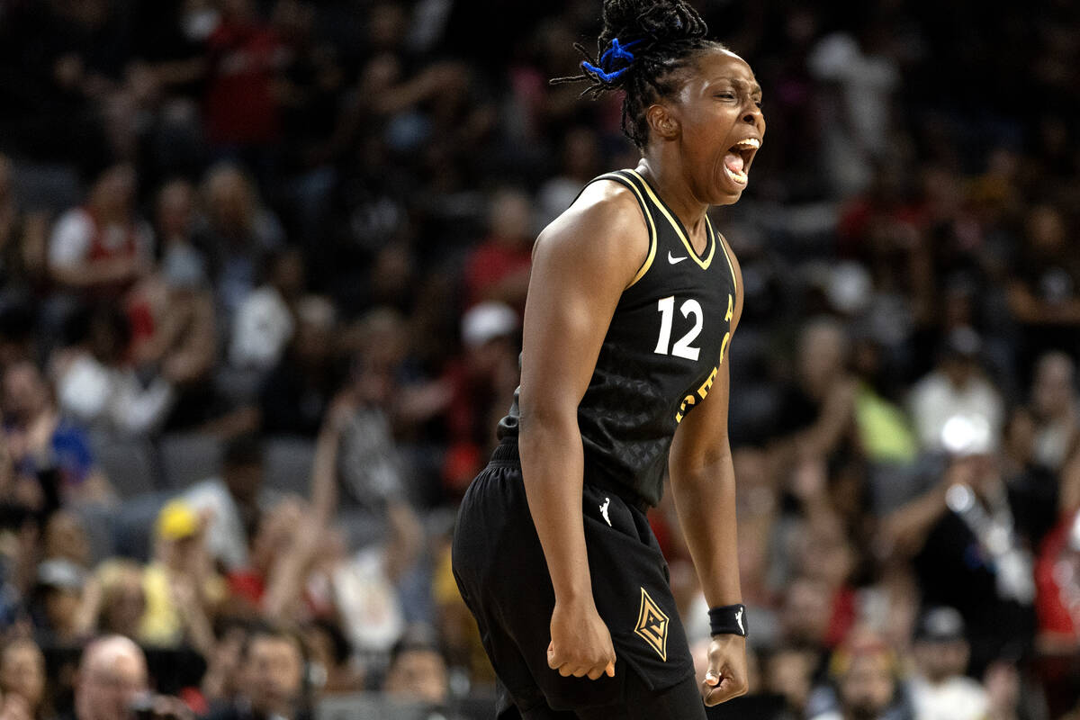 Las Vegas Aces guard Chelsea Gray (12) celebrates after scoring during the second half of a WNB ...