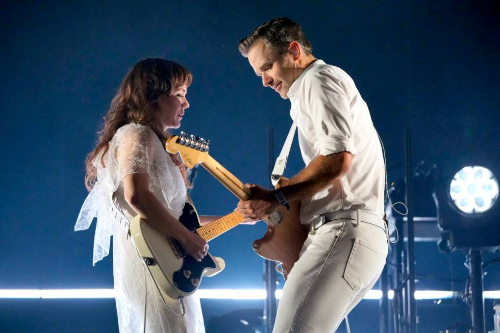 Jenny Lewis, left, and Ben Gibbard of The Postal Service perform on day two of Riot Fest on Sat ...