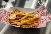 Fries with Thai sweet chili mayo from Fukuburger at Allegiant Stadium, home of the Las Vegas Ra ...