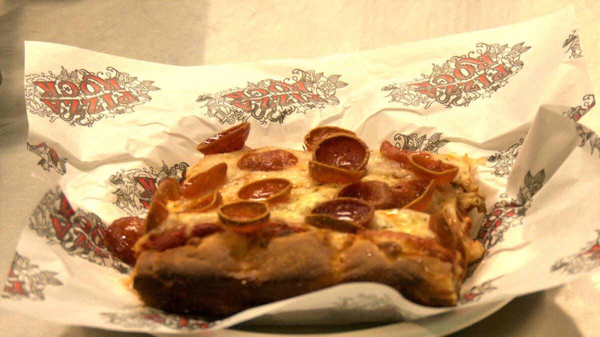 A Sicilian pepperoni pizza slice from Pizza Rock at Allegiant Stadium, home of the Las Vegas Ra ...