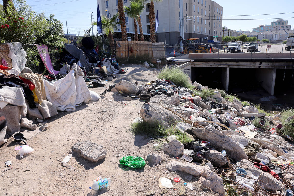 People camp along the Tropicana Wash near Palos Verdes Street east of the Strip in Las Vegas on ...