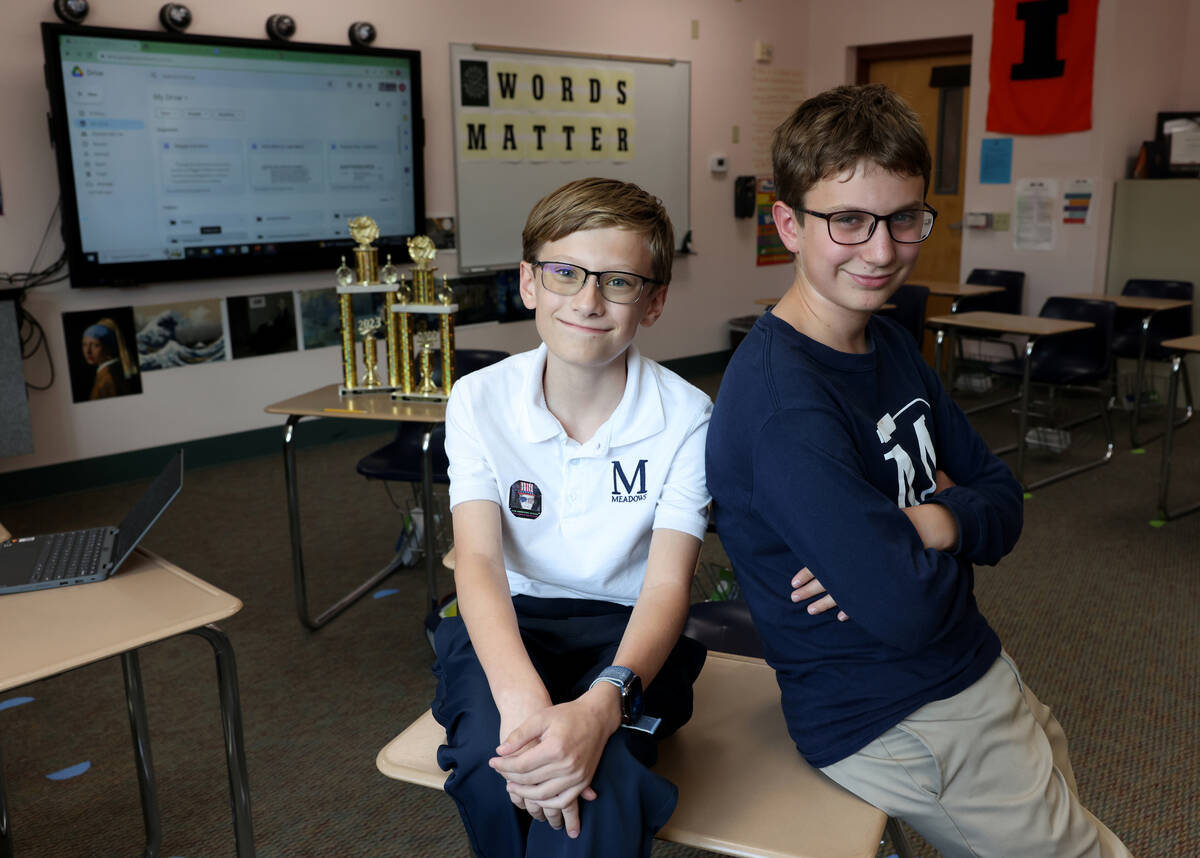 Seventh grader Elliot Lefebvre, left, and sixth grader William Russman pose for a photo at The ...