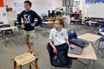 Seventh grader Elliot Lefebvre, left, and sixth grader William Russman talk to a reporter at Th ...
