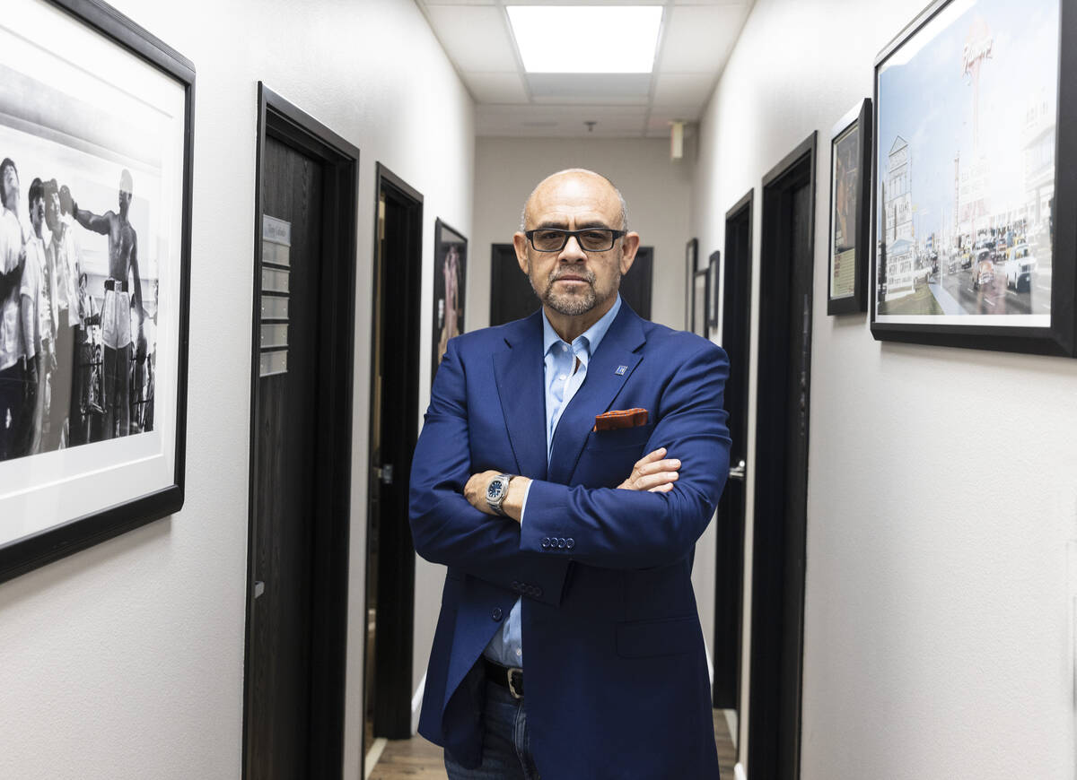 Noah Herrera, a real estate broker, poses for a photo at his Henderson office, on Friday, Sept. ...