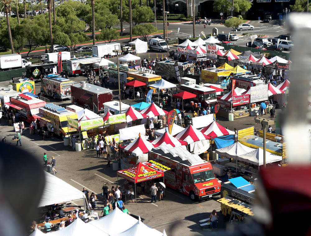Different foods and events occur at the Great American Foodie Fest at the Sunset Station in Hen ...