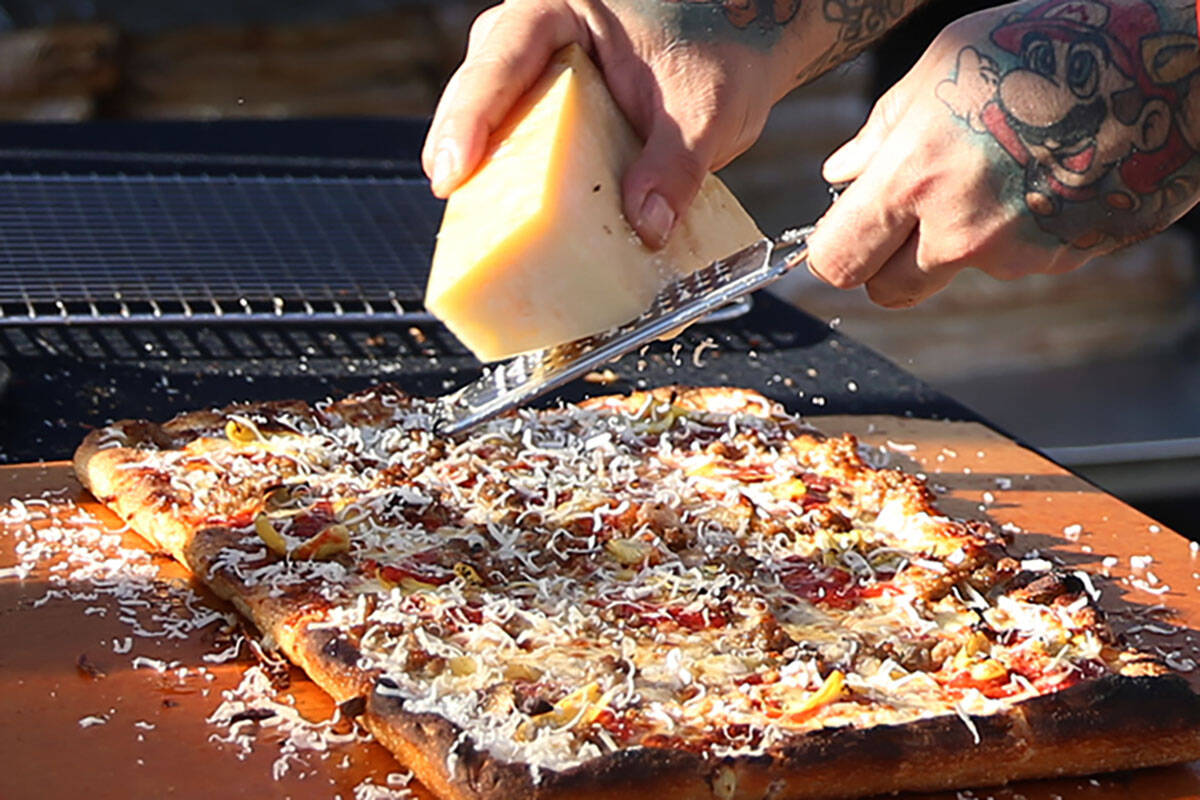 Gilbert Perez of Good Pie makes a pizza during the Las Vegas Pizza Festival at The Industrial E ...