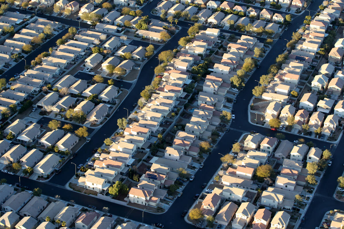 Southwest Las Vegas homes are seen from a hot air balloon piloted by Daniel Liberti of Rainbow ...