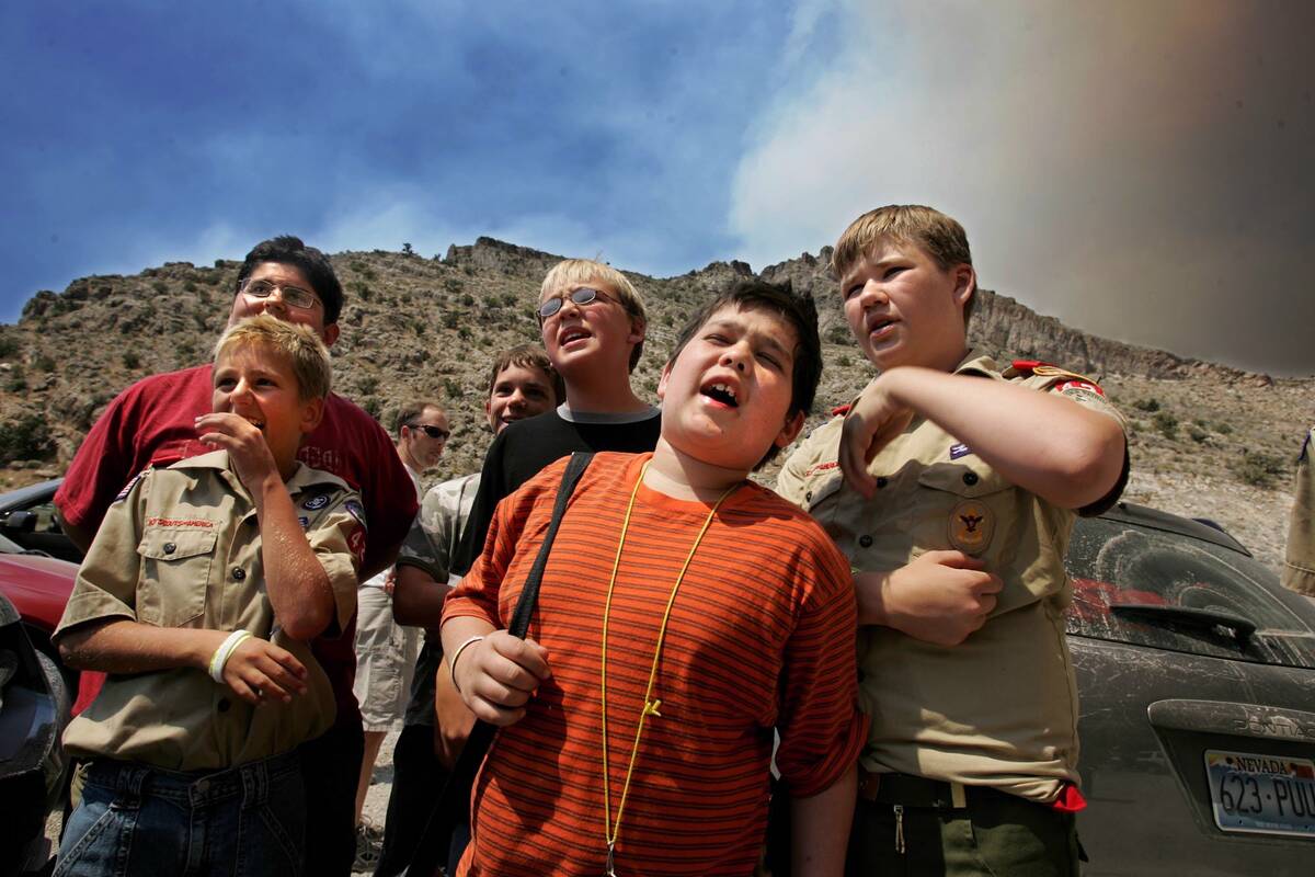 Boy Scouts with Summerlin Troop 423 watch the fire from Goodsprings after being evacuated. (Las ...