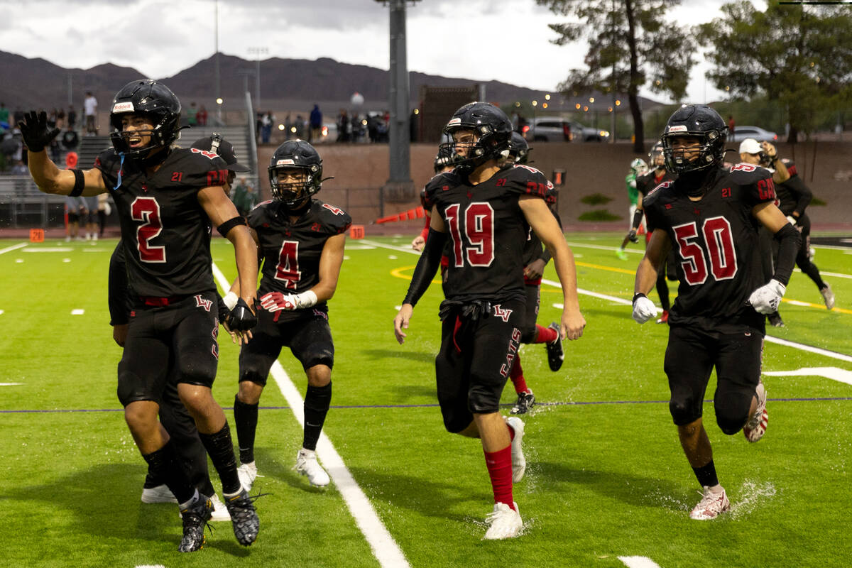 Las Vegas players including wide receiver Tommy Vibabul (2) and Julian Torres (4) celebrate a t ...