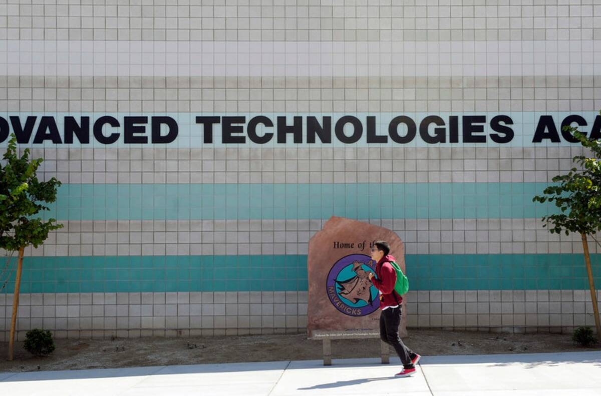 A student departs the Advanced Technologies Academy campus after school in 2011. (Las Vegas Rev ...