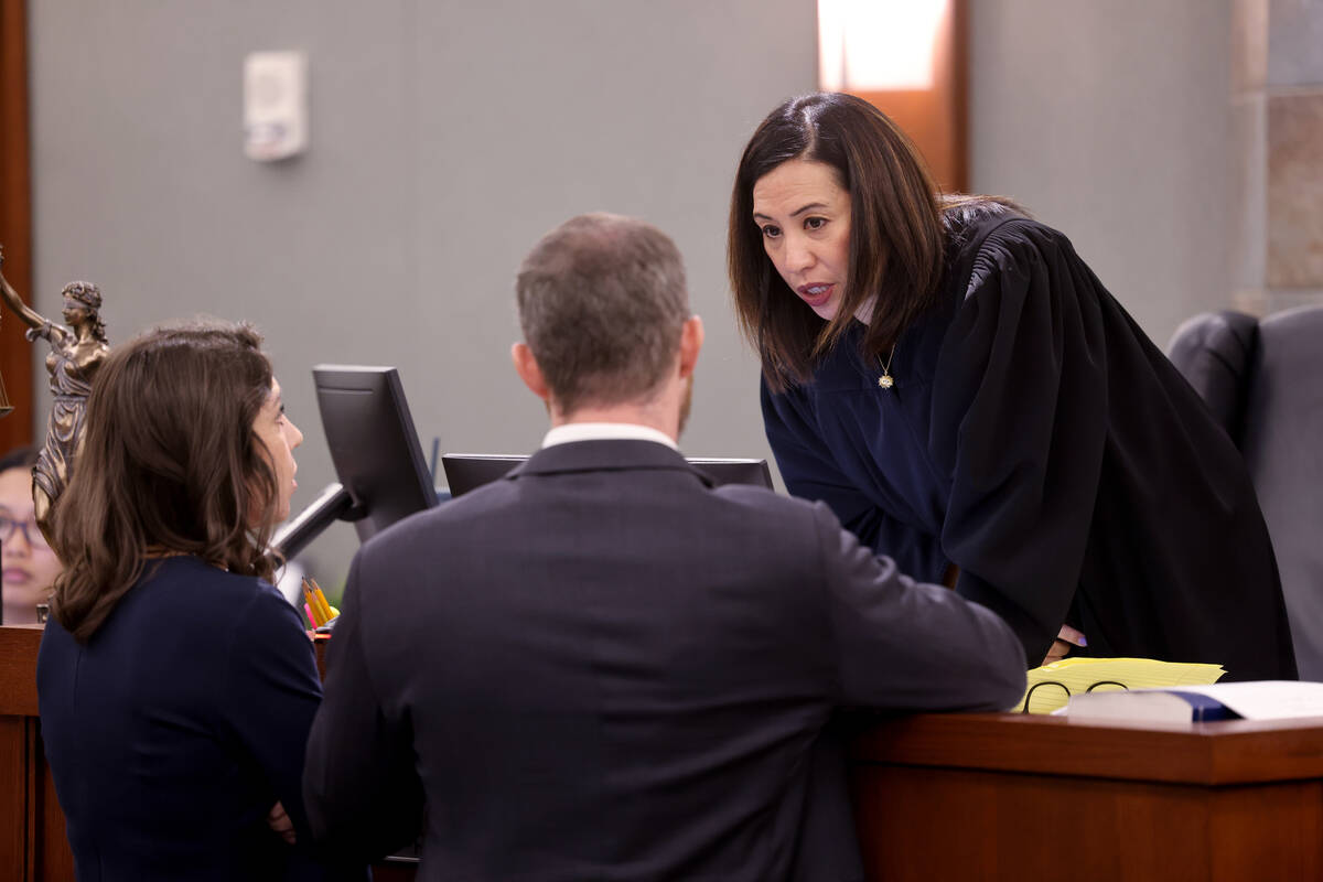Clark County District Court Judge Danielle Chio meets with Jackie Nichols, an attorney represen ...