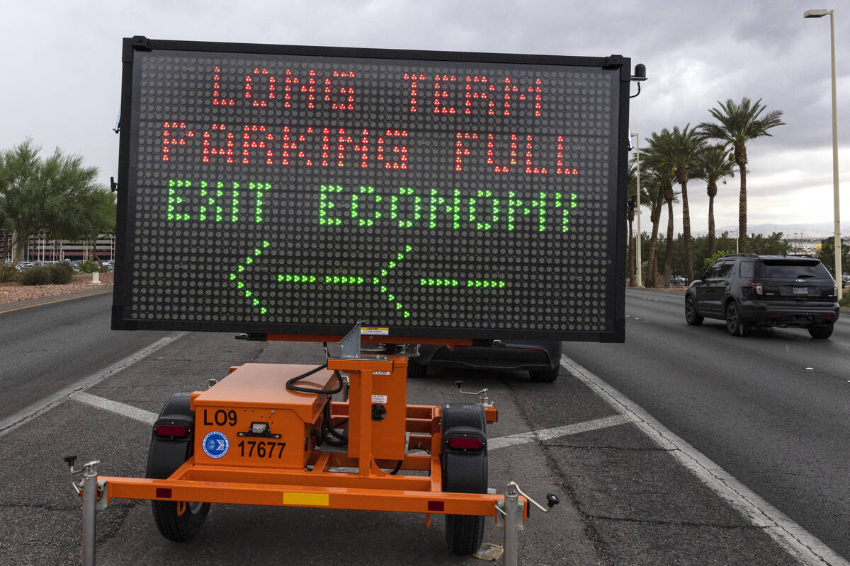 Long term parking lots are full sign is displayed to inform arriving passengers at Harry Reid I ...