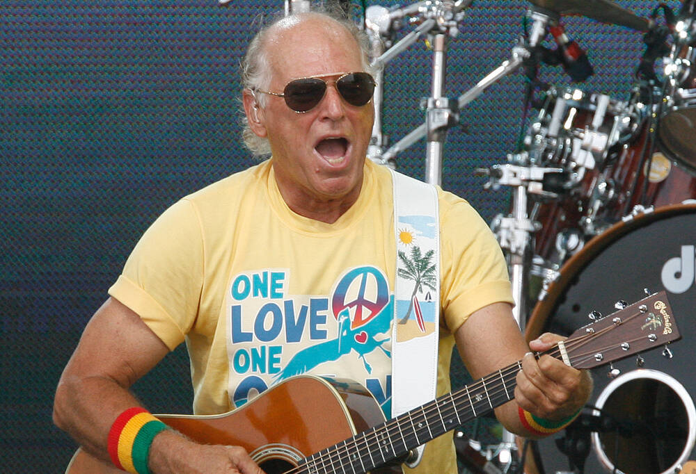 Jimmy Buffett performs in Gulf Shores, Ala., on July 11, 2010. (Chip English/AP)