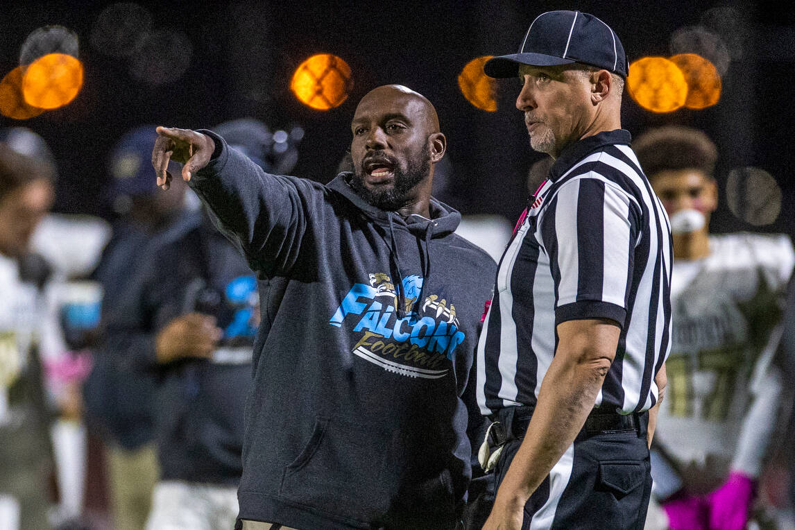 Foothill coach Vernon Brown discusses a penalty call on Canyon Springs during the first half of ...