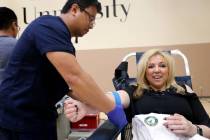 Syndicated radio personality and professor Dr. Daliah Wachs donates blood with United Blood Ser ...