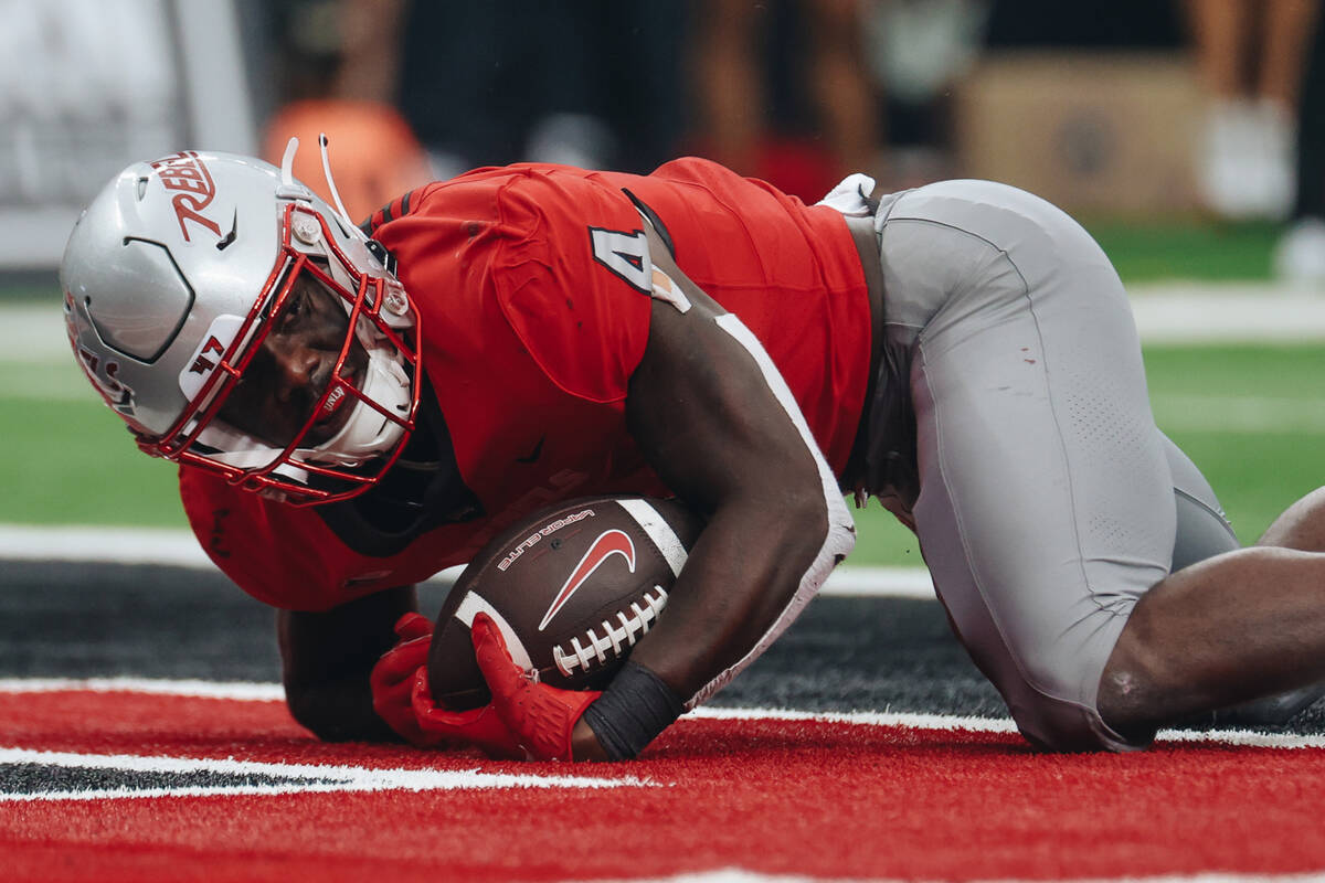 UNLV running back Donavyn Lester (4) makes a touchdown during a game against Bryant at Allegian ...