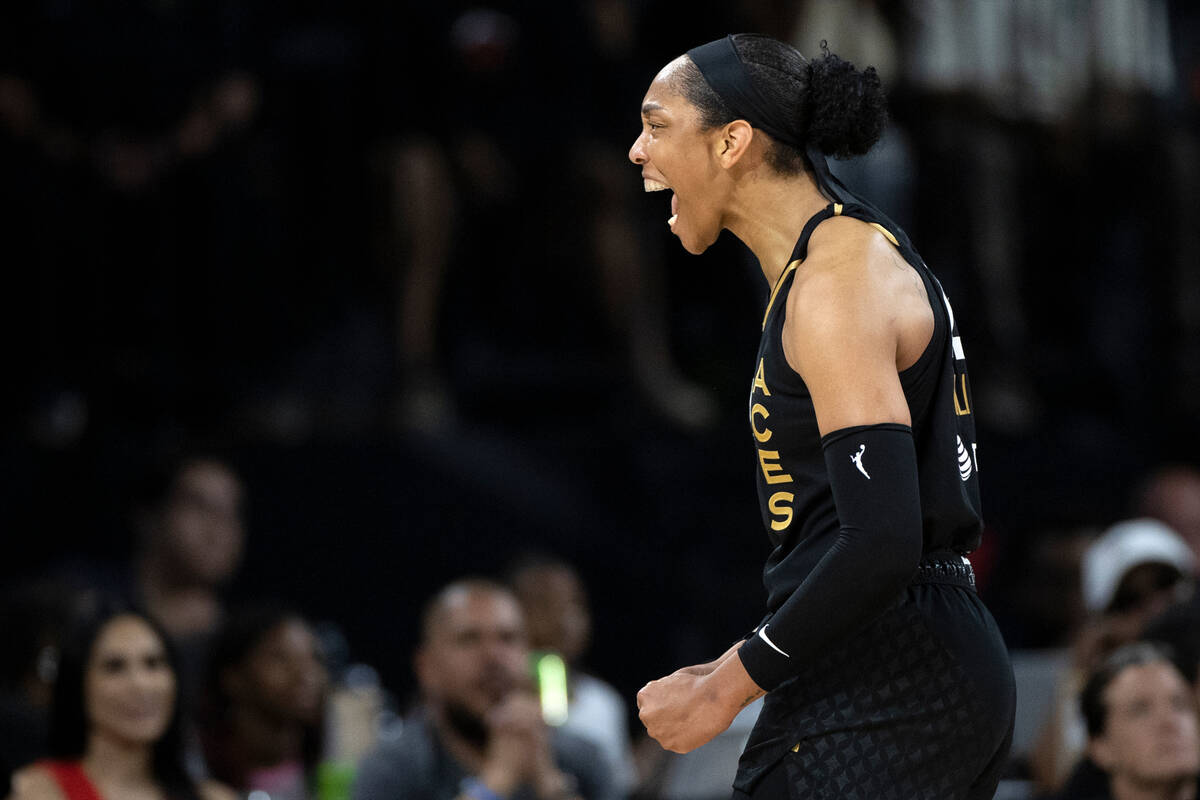 FILE - Las Vegas Aces forward A'ja Wilson (22) celebrates after sending the Seattle Storm to a ...
