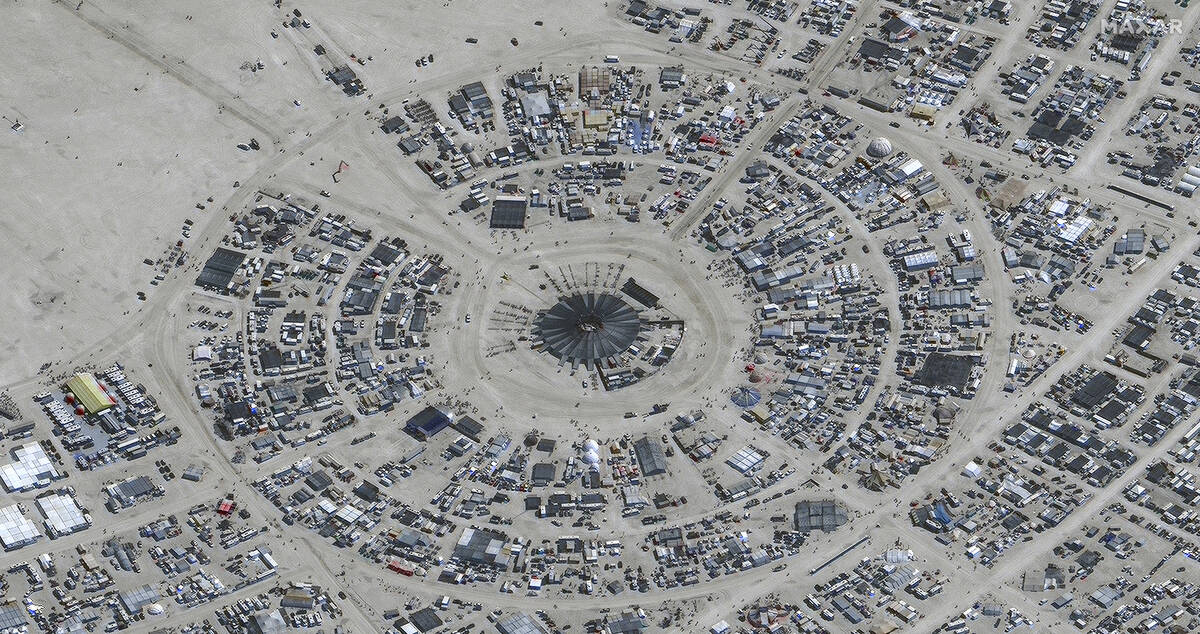 In this satellite photo provided by Maxar Technologies, an overview of Burning Man festival in ...