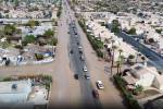 Heat, humidity build cells that drop light rain on the valley