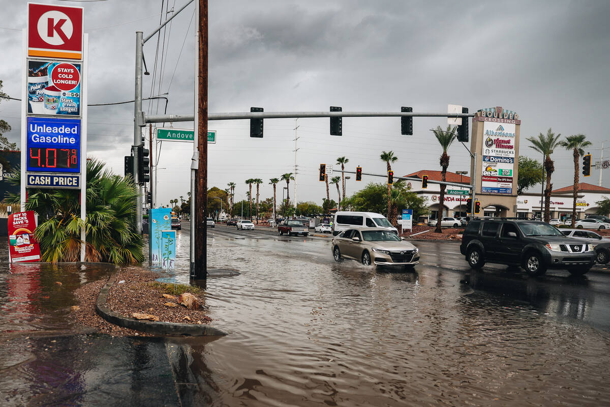 Water floods into the street near a Circle K gas station at 5485 E. Tropicana Ave. on Friday, S ...