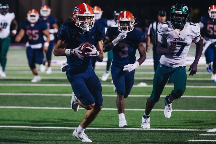 Bishop Gorman wide receiver Audric Harris (2) runs the ball into the end zone for a touch down ...