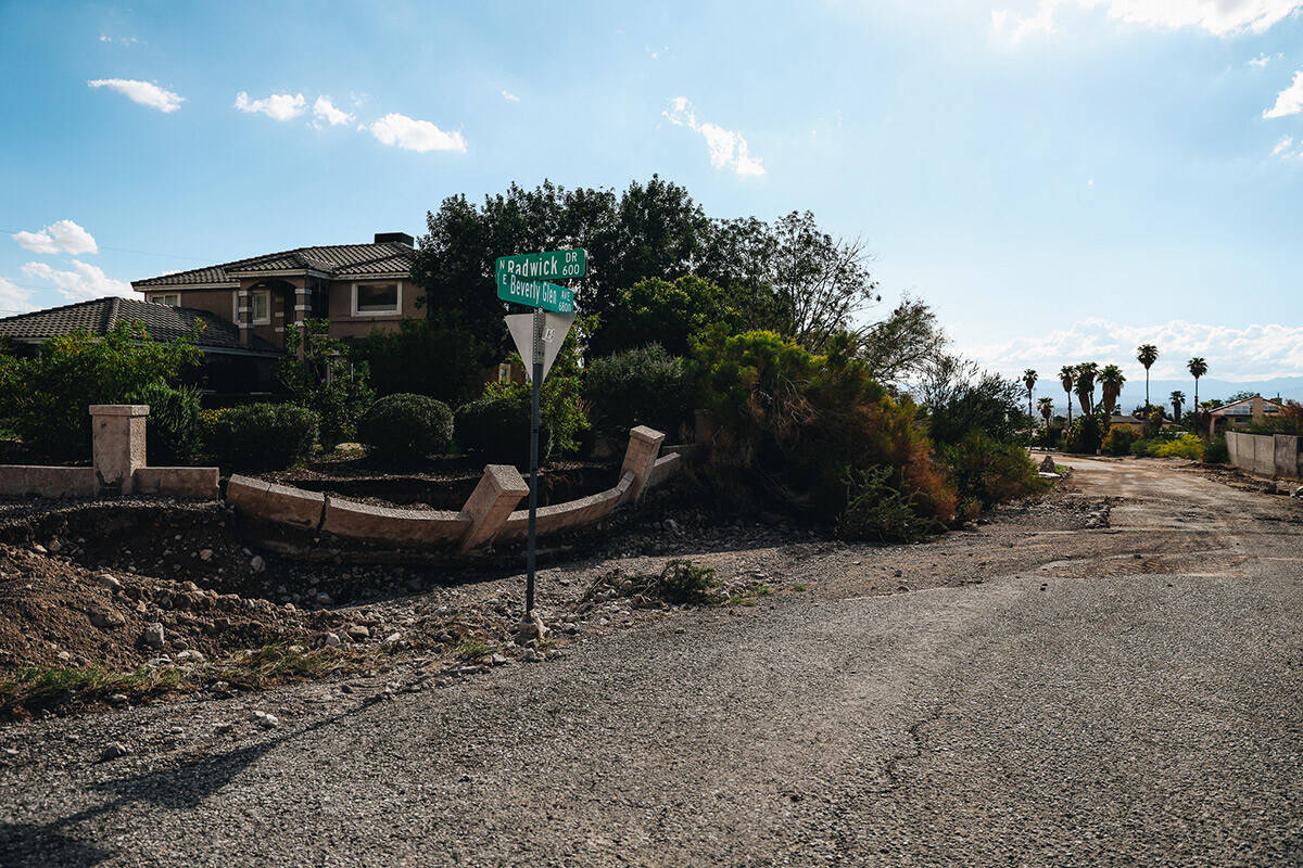 Damage from flooding is seen on East Beverly Glen Road Sunday, Sept. 3, 2023, in Las Vegas. (Ma ...