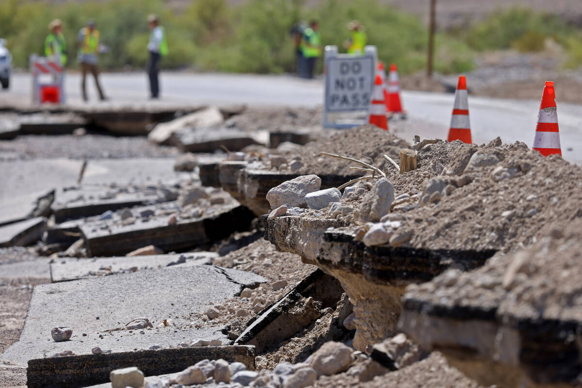 Storm damage from Hilary is shown on State Route 190 on the way to Furnace Creek in Death Valle ...