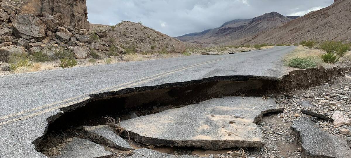 A collapsed section of pavement on Emigrant Canyon Road is shown in this undated photo from Dea ...