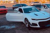 A white Camaro with a "Ruthless" window decal was confiscated by police after the unidentified ...