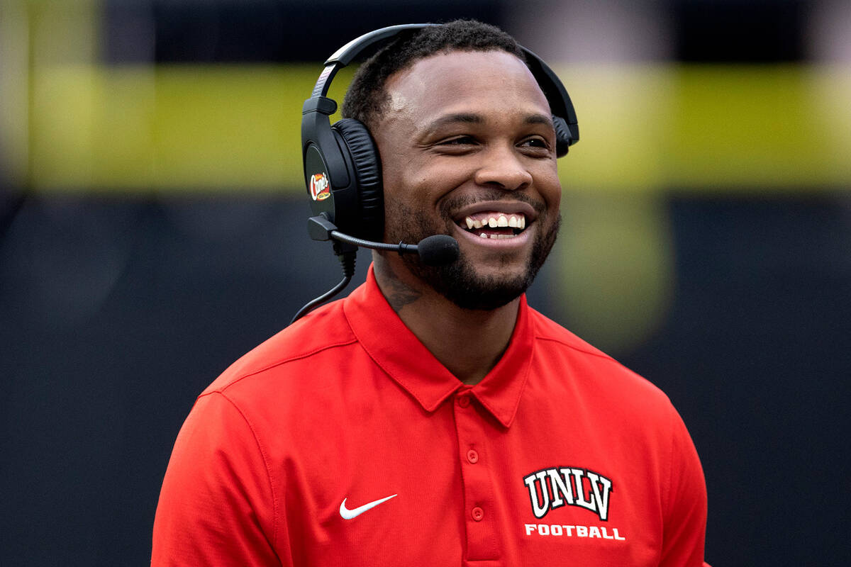 Offensive coordinator Brennan Marion laughs from the sidelines during the UNLV spring showcase ...